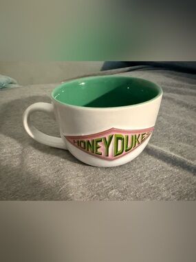 Warner Bros. Honeydukes Ceramic Mug with Green Interior and Pink Logo